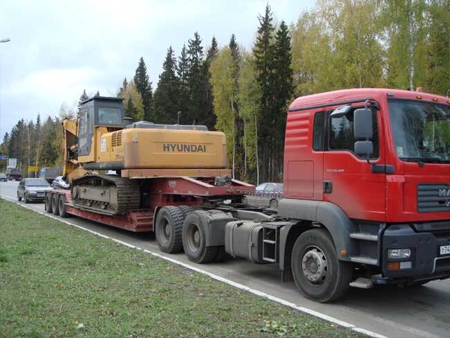 Аренда трала корыто с передним заездом 3 оси 45 тонн 13.6 м.